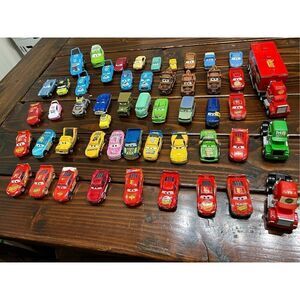 HUGE LOT 50 DISNEY PIXAR CARS - TRUCKS HAULERS DIE CAST & PLASTIC PEZ - RARE
